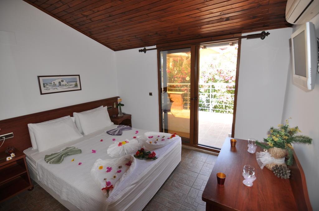Longhouse Inn Hotel Дальян Номер фото